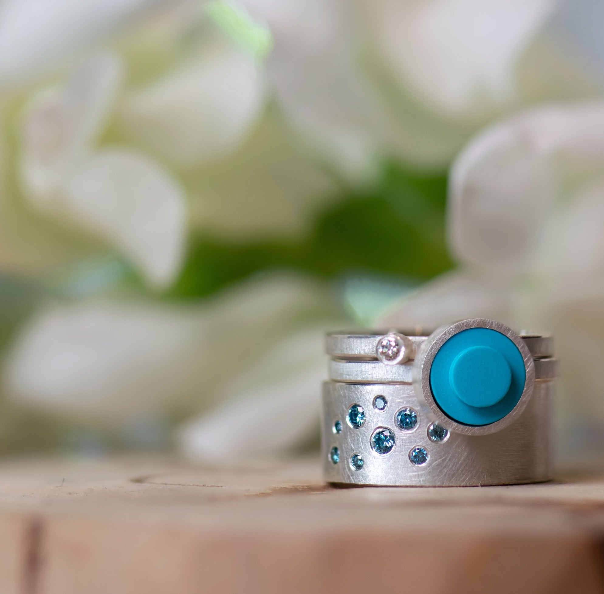 blue diamond, silver, and round aqua LEGO® stackable rings