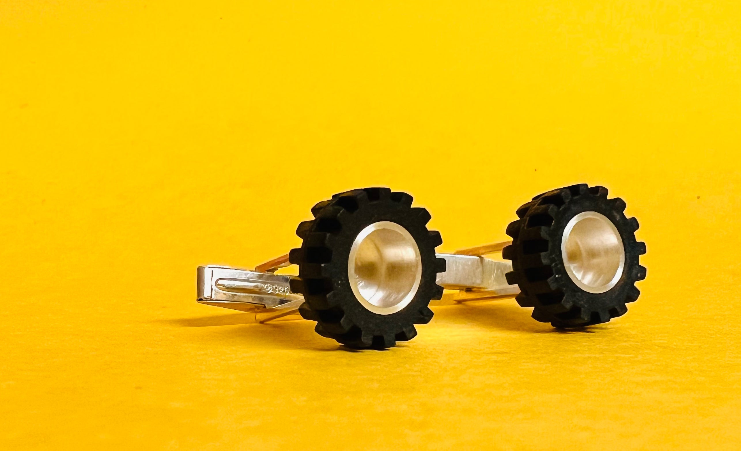 cuff links made from lego tires