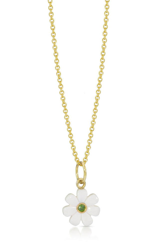 White LEGO friends flower charm with a green diamond set in the center and a gold ring on top with a gold chain going through it