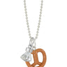 Lego toy gem with silver on top to make into a charm hanging off a chain with a lego toy pretzel