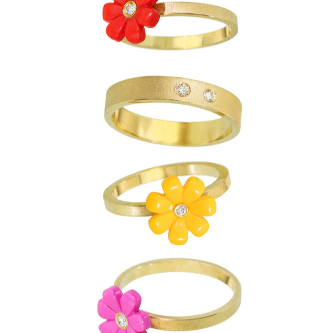 LEGO friends flowers on 18kt yellow gold rings with diamonds set into the middle of the LEGO flowers