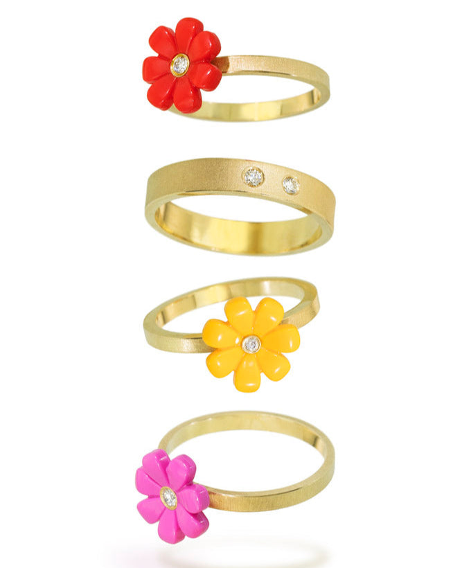 LEGO friends flowers on 18kt yellow gold rings with diamonds set into the middle of the LEGO flowers