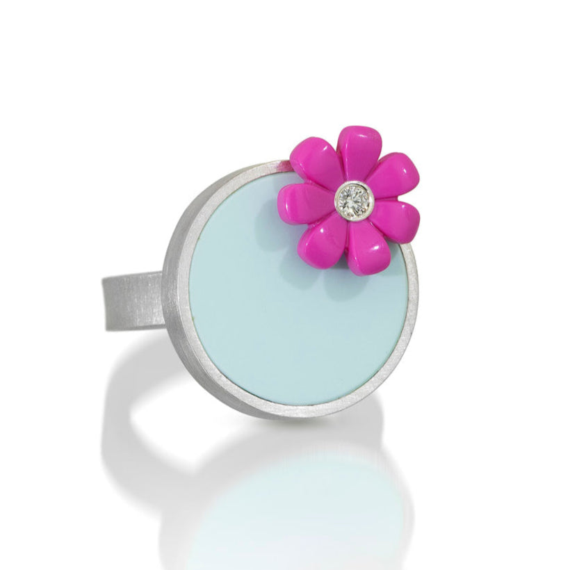 a cute LEGO ring handmade with sterling silver, a diamond , a round LEGO tile and a pink LEGO friends flower