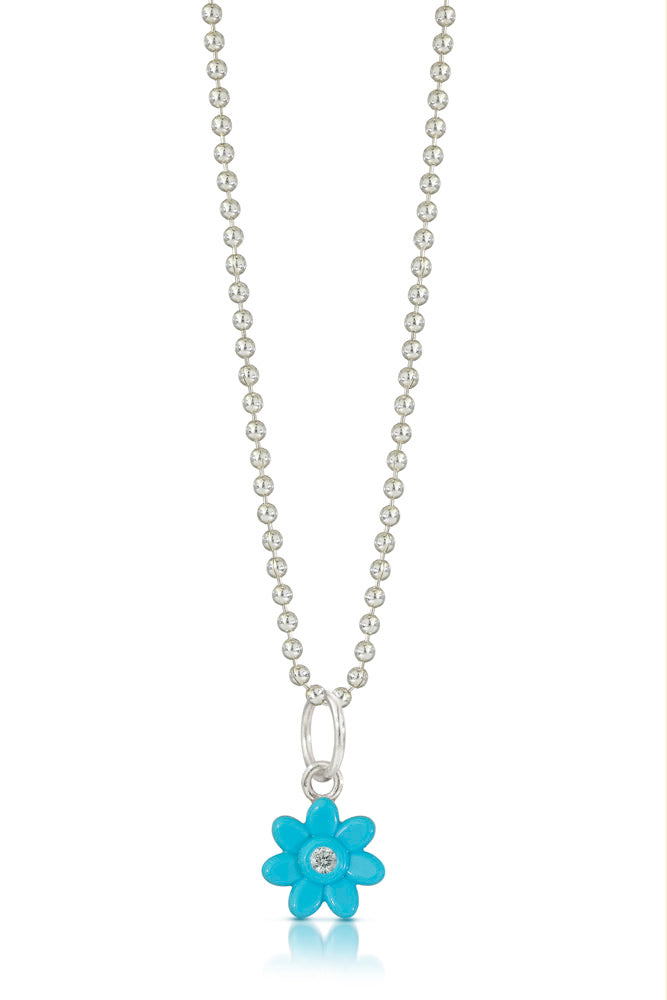 Turquoise lego Troll flower charm with a diamond in the center hanging on a silver beaded chain