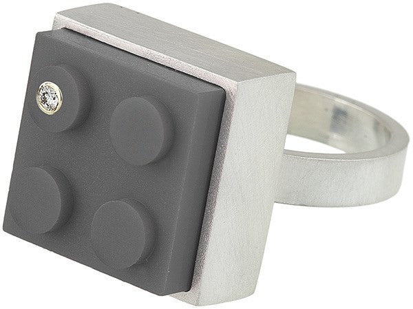 Modern sterling silver LEGO ring with a diamond set into a gray 2 X 2 LEGO brick