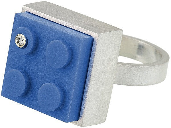 Contemporary ring with a diamond set into a blue 2 X 2 LEGO brick