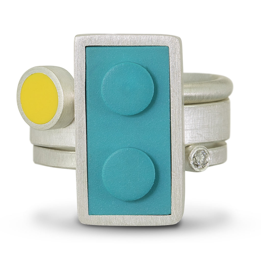 1 X 2 LEGO brick ring made with sterling silver, shown with two stacking rings to create a statement ring.