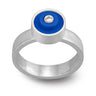 Ring with a bright blue round lego dot on top with a diamond set into the center