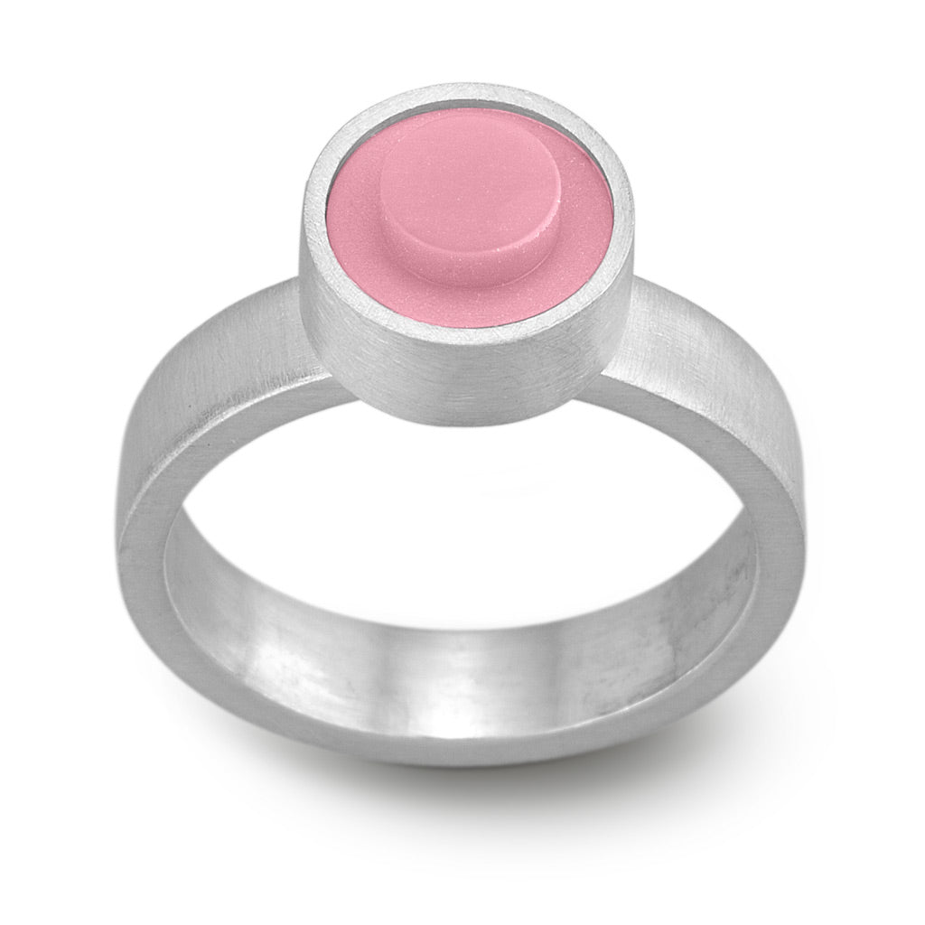 Sterling silver bold ring with a round LEGO dot bezel set on top