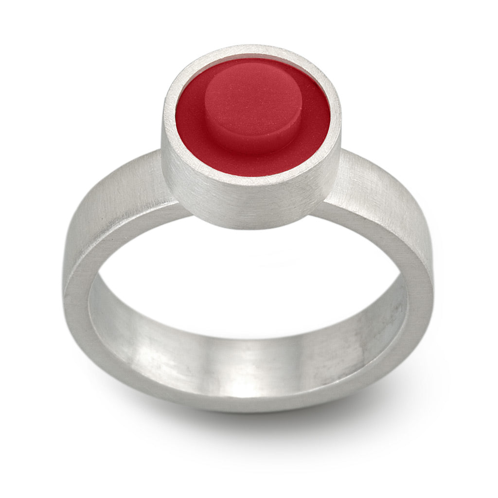Red LEGO stud set into a sterling silver handmade ring
