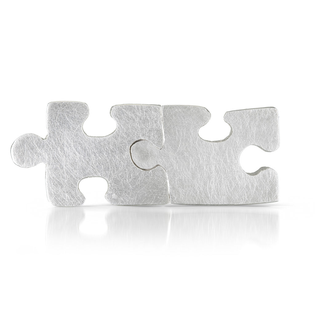 sterling silver puzzle piece earrings that fit together