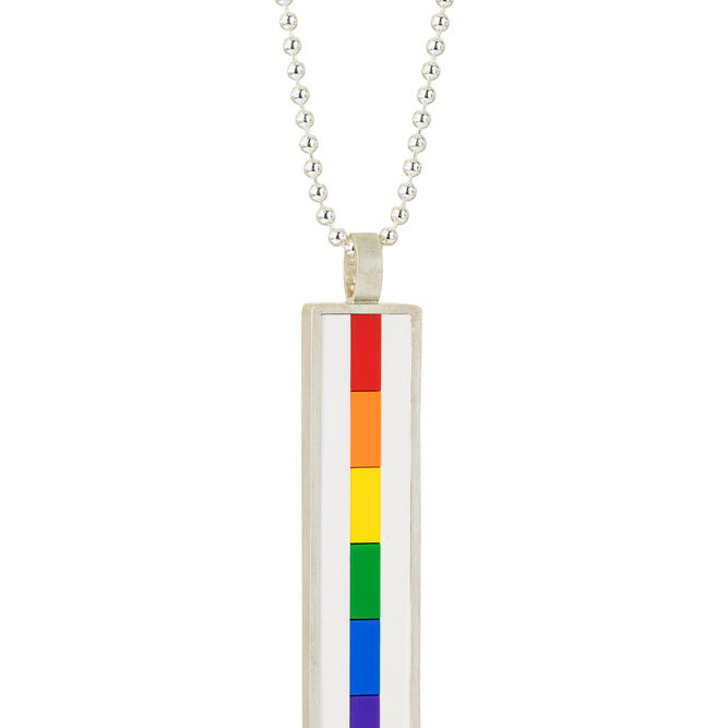 vertical pendant with the side profile of LEGO bricks set into a sterling silver bezel from red , orange, yellow, green ,blue and  purple forming the Rainbow colors in order and  hangin off a bead chain
