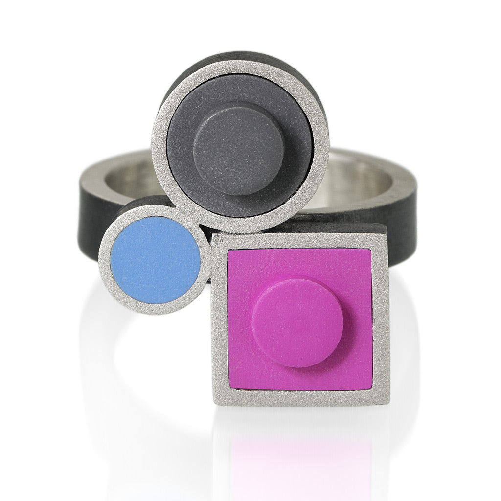 LEGO ring made with sterling silver with  3 different LEGO pieces, a square 1 X 1 LEGO brick, a Round stud LEGO brick and the top of a LEGO stud piece