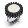 small recycled LEGO truck tire made into a contemporary modern ring with white round LEGO tile in center on a sterling silver 4mm band with dark oxidized finish