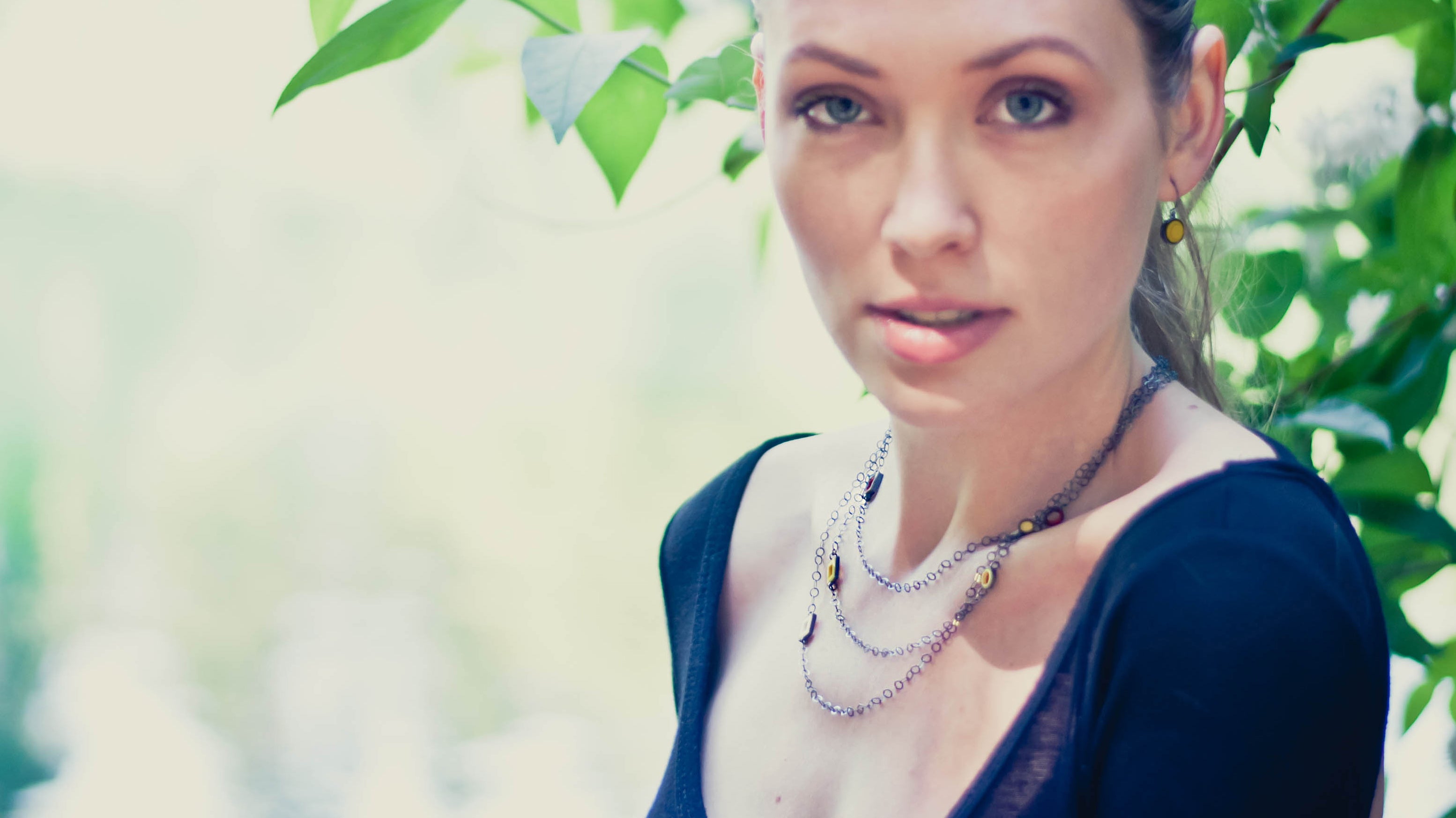 woman with modern layered necklace