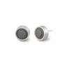 Pair of round grey LEGO dot earrings set into silver on a white background