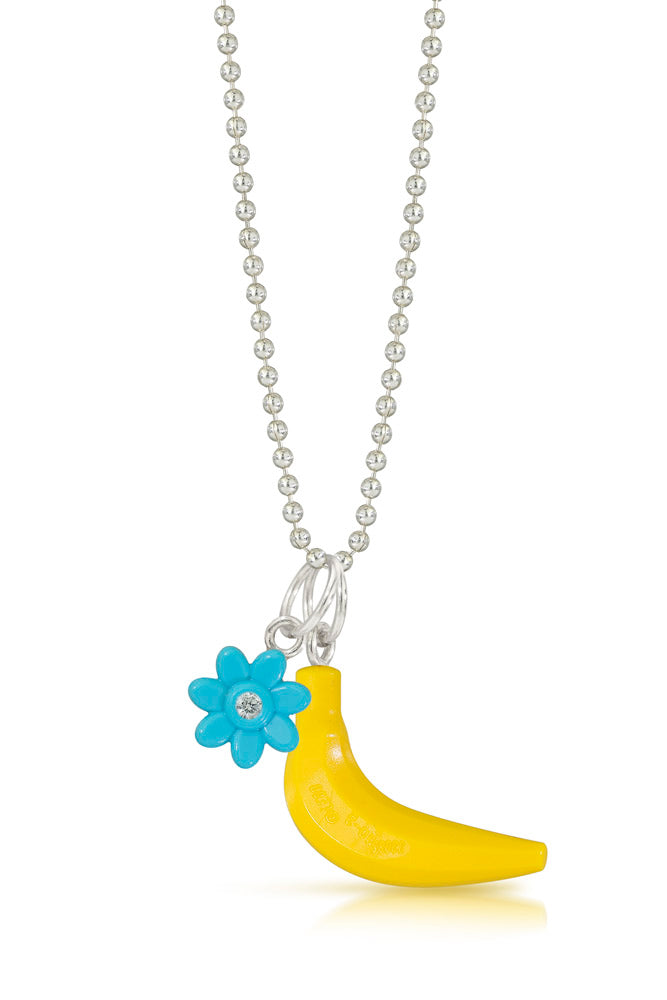 LEGO troll flower charm with a diamond set in the middle and  hanging from a silver chain together with a lego banana charm
