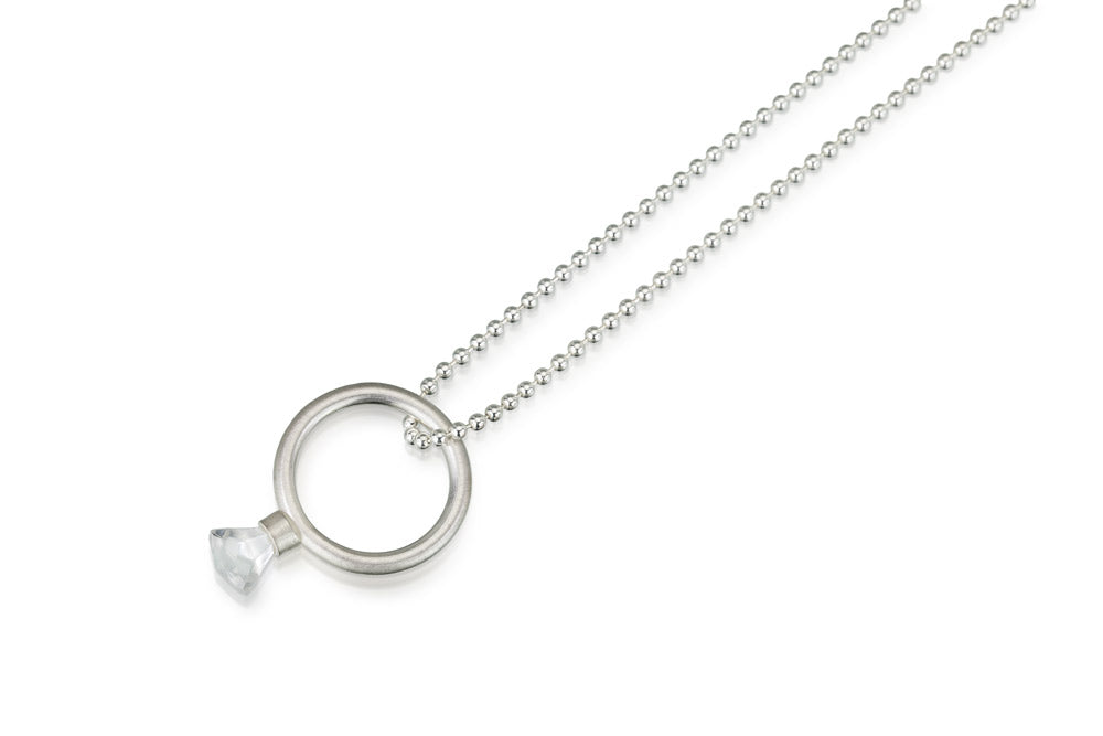 LEGO mini-fig toy gem on top of a ring that is handing off a chain