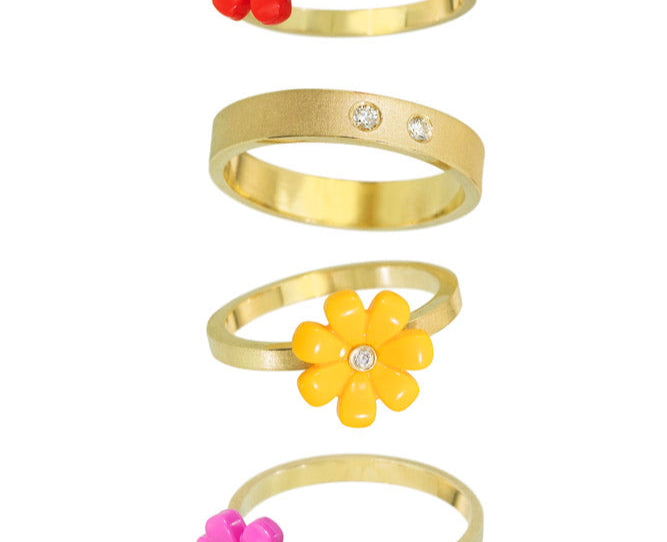 LEGO friends flowers on 18kt yellow gold rings with diamonds set into the middle of the LEGO flowers 