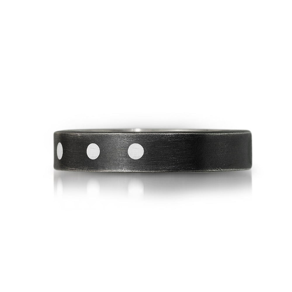 sterling silver  ring with oxidized finish   with 3 white dots inserted in metal. 3 dots are from recycled lego bricks 