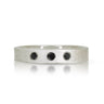 sterling silver band with a satin finish and 3 black diamonds set flush into the silver