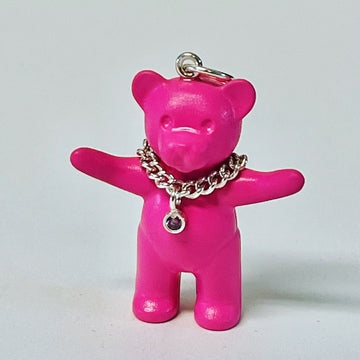 Belville and Scala cute pink lego teddy bear wearing a necklace with a pink diamond on it. has a silver link at top to be worn on a chain or bracelet as a charm
