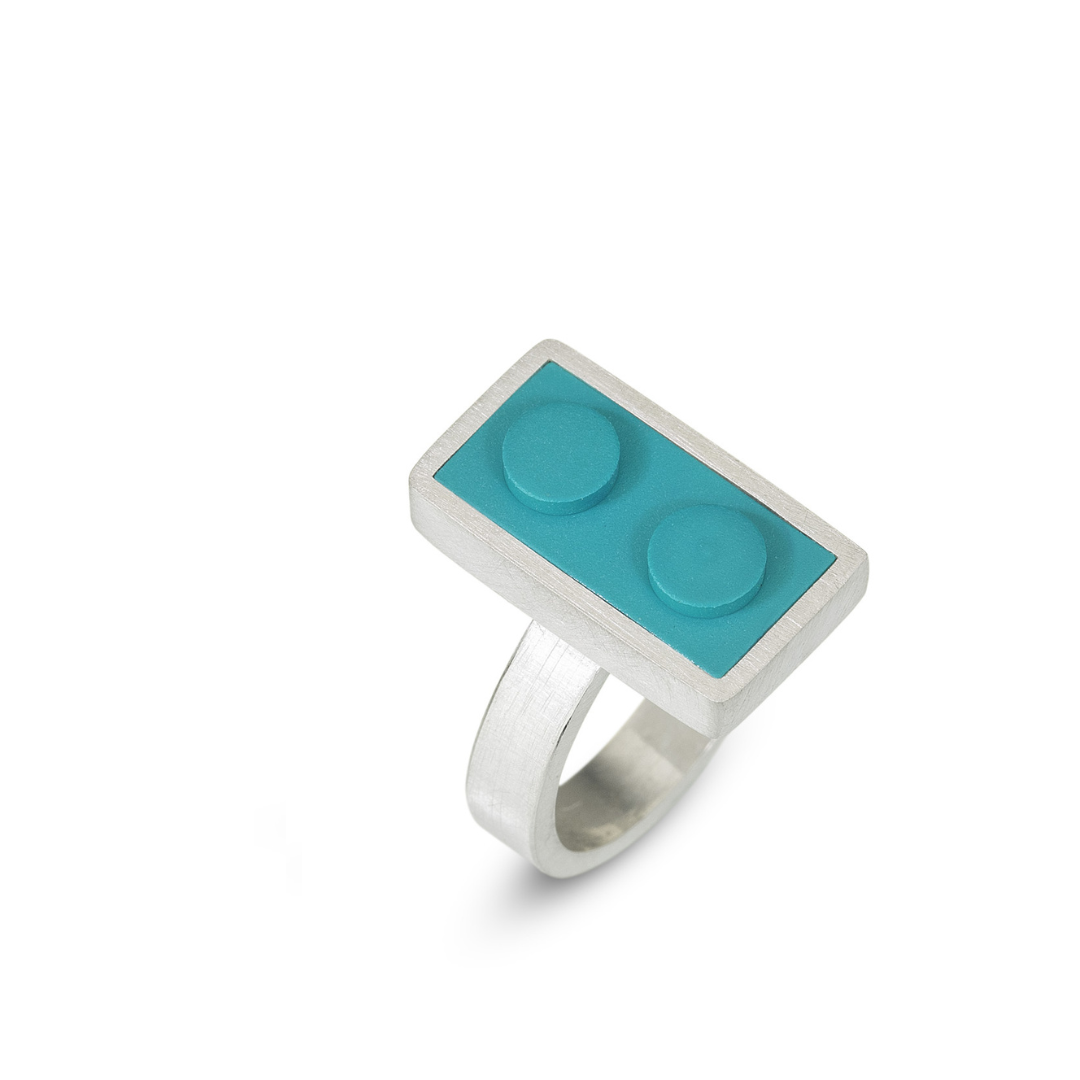 1 X 2 turquoise LEGO brick set into a  handmade sterling silver ring 