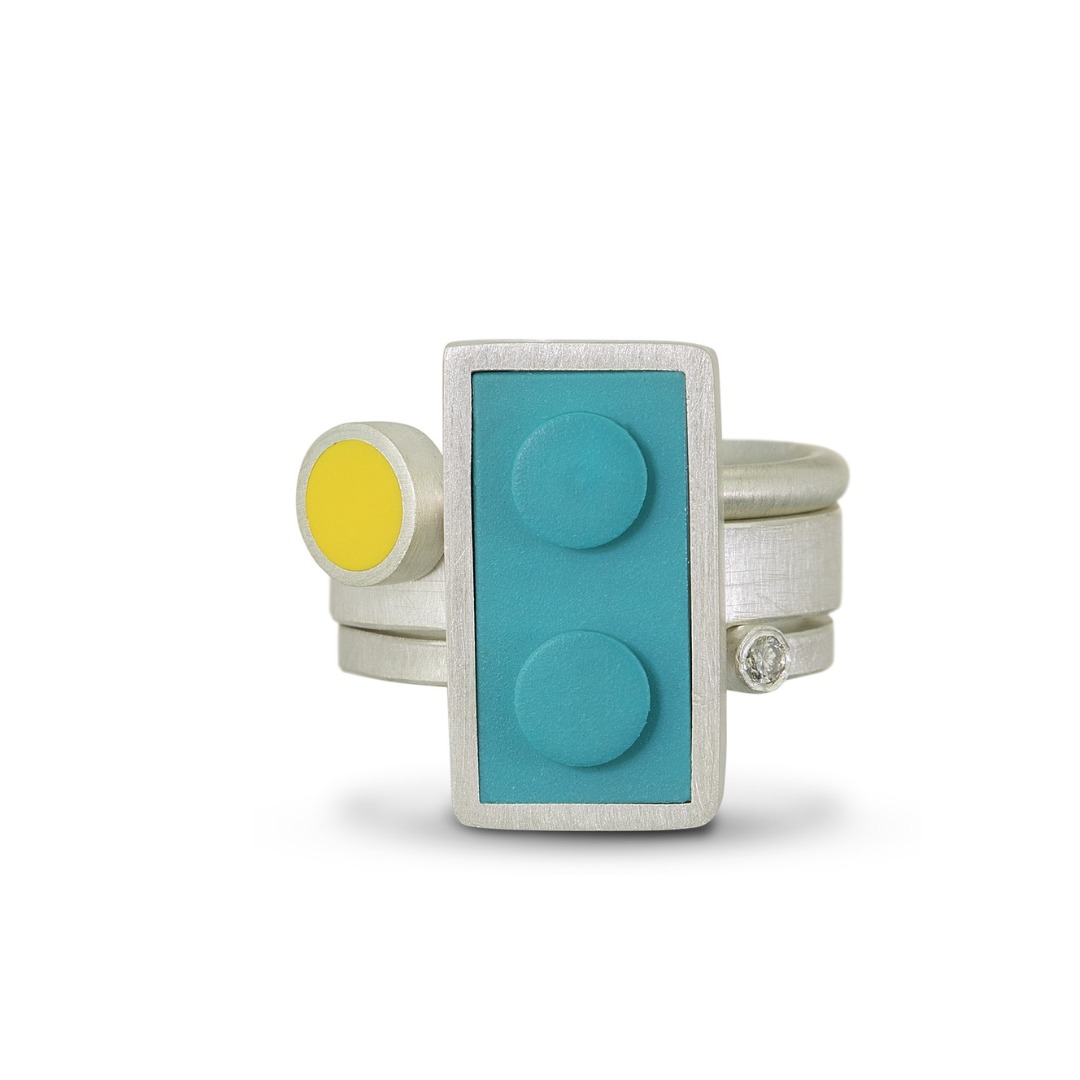 1 X 2 LEGO brick ring made with sterling silver, shown with two stacking rings that fit snug together to create a statement ring.