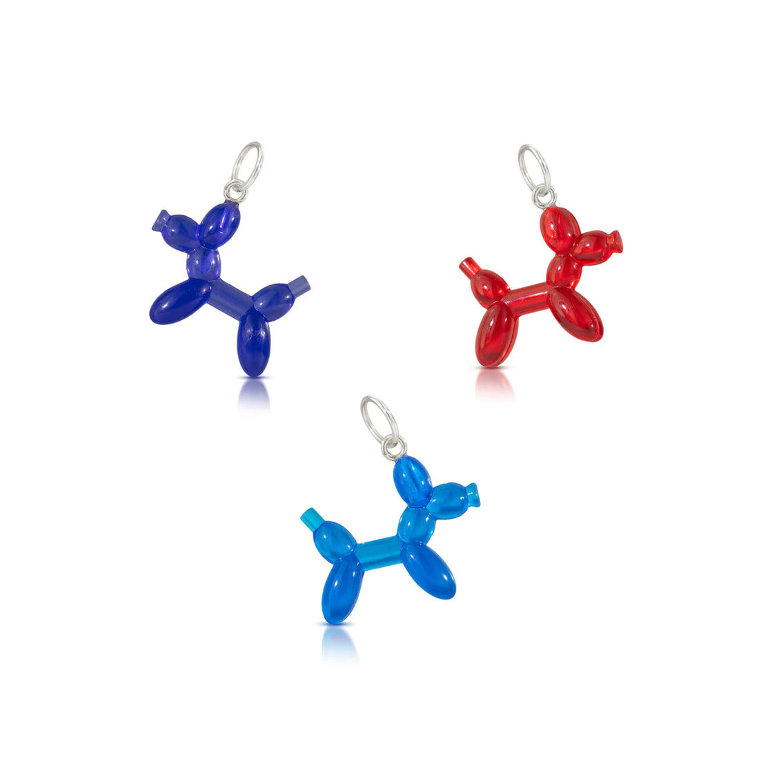 3 little transparent LEGO mini figure balloon dog charms that look like they are dancing in red, blue and purple