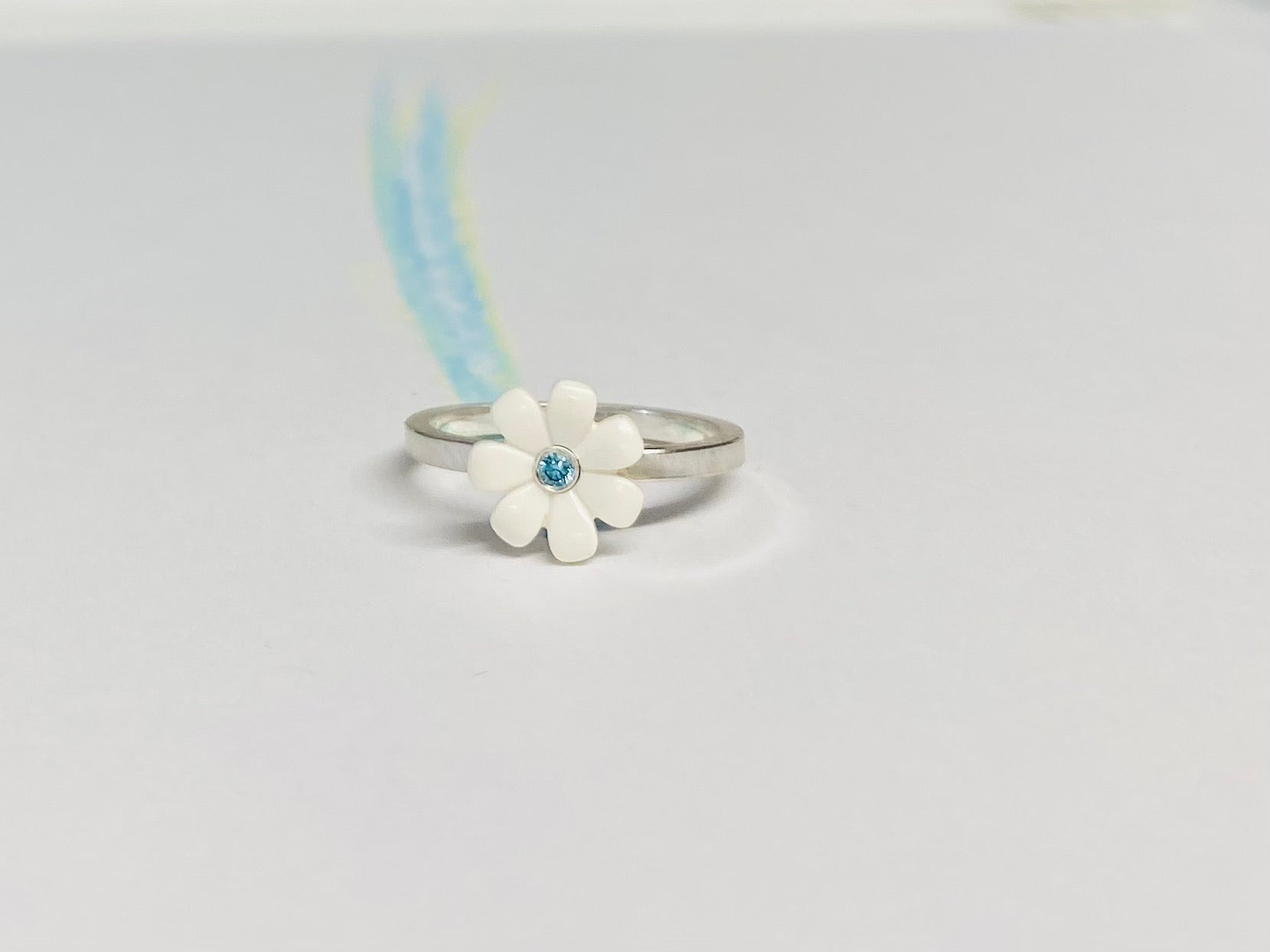White Daisy ring with aqua Diamond
