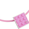 2 X 3 pink recycled LEGO brick hand made into a  modern, simplistic pendant with a diamond