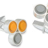 A pair of sterling silver cufflinks with orange and grey LEGO studs