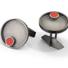 Hand fabricated sterling silver round modern cuff links with small round red LEGO piece with patina finish
