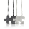 Autism Awareness hand fabricated sterling silver puzzle piece pendants that fit together but worn separately