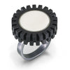 recycled LEGO truck tire made into a contemporary modern ring with white round LEGO tile in center 