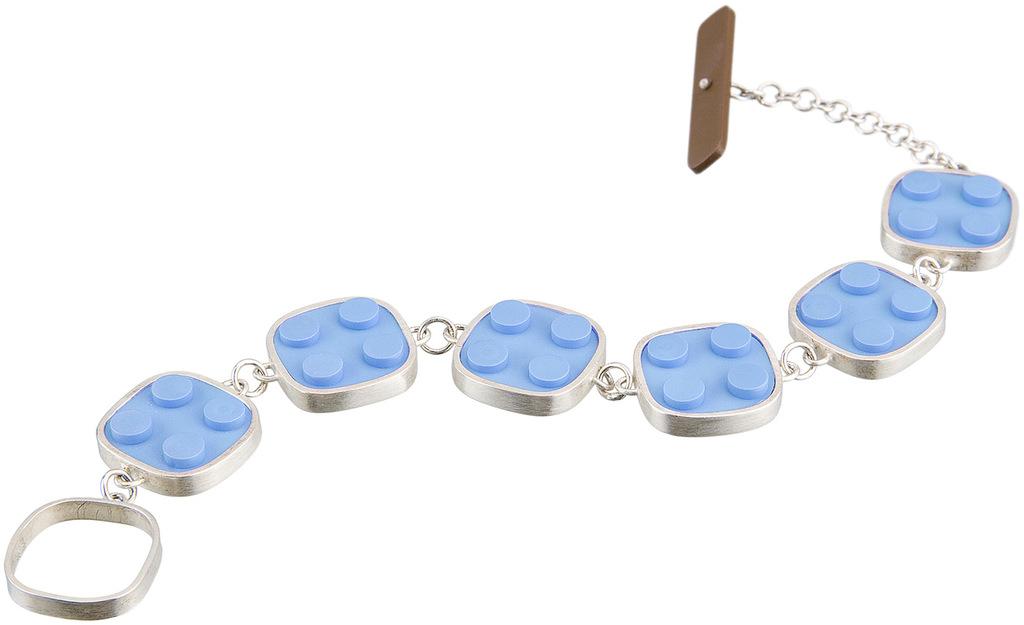 2 X 2 light blue LEGO bricks made into a modern, contemporary art jewelry bracelet 