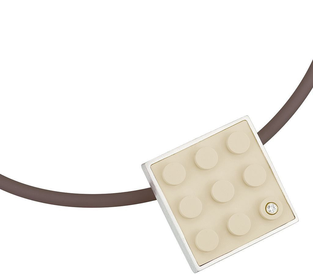 2 X 3 Tan LEGO brick set into a Contemporary, modern sterling silver with a diamond